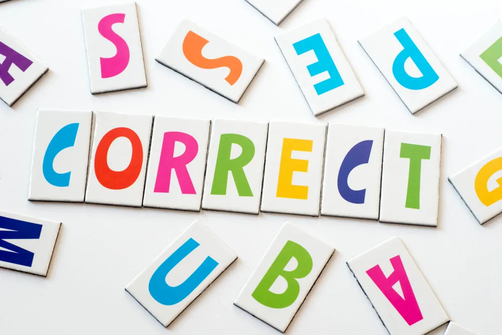 Word,Correct,Made,Of,Colorful,Letters,On,White,Background
