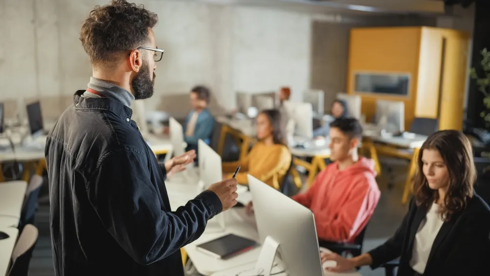 https://www.shutterstock.com/fr/image-photo/teacher-giving-lesson-diverse-multiethnic-group-2102451313
